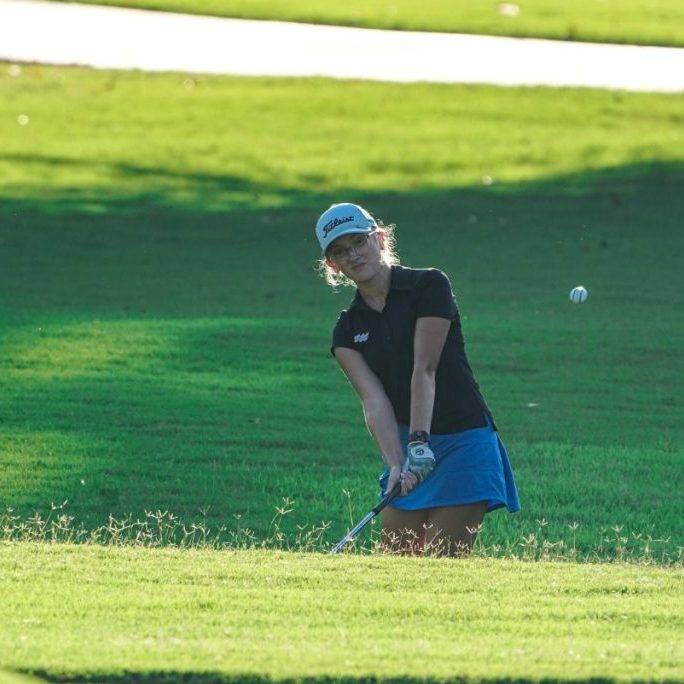 South Gibson's Anna Claire Hardin chips onto the green during a high school golf match at Jackson Country Club on Aug. 11, 2026.