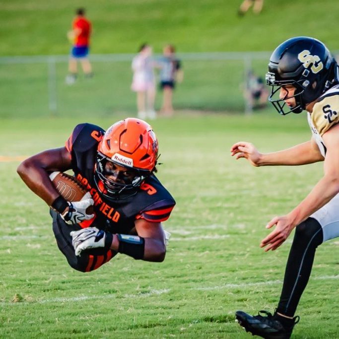 Greenfield's Jerrick McMullen (9) dives forward for more yards against Stewart County during a high school football game at Greenfield on Aug. 28, 2026. Photo by Christel Laney.