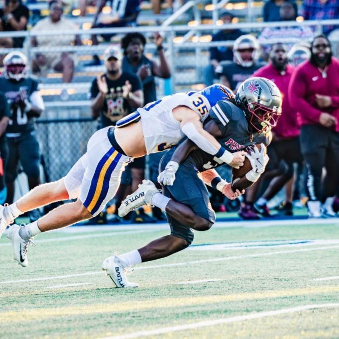 Westview's Finn Snider (35) makes a tackle against MASE during a high school football game at St. Benedict of Auburndale on Aug. 21, 2026. Photo by Christel Laney.