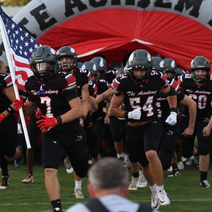 The Fayette Academy football team runs out before playing Rossville Christian in Week 2 action at Fayette Acadmy.