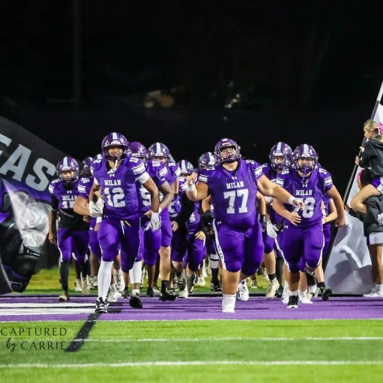 The Milan Bulldogs run onto the field before playing Union City at Johnnie Hale Stadium on Oct. 2, 2026.