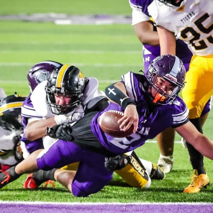 Milan's Carson Kelley (2) scores a touchdown against Halls during a Region 7-2A high school football game at Johnnie Hale Stadium on Oct. 16, 2026. Photo by Carrie Hurt.