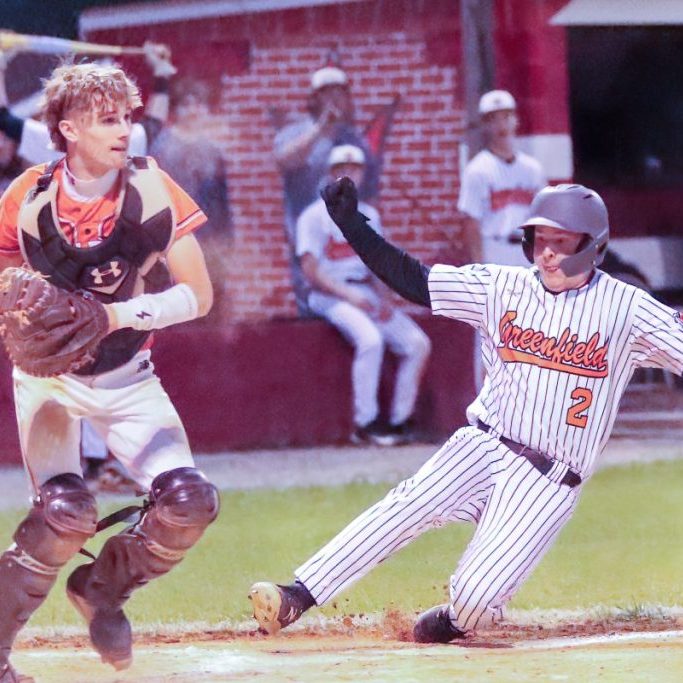 Greenfield's Trey Morris (2) slides safely into home plate against Gleason during a game int he District 14-1A high school baseball tournament at South Fulton on April 29, 2026.
