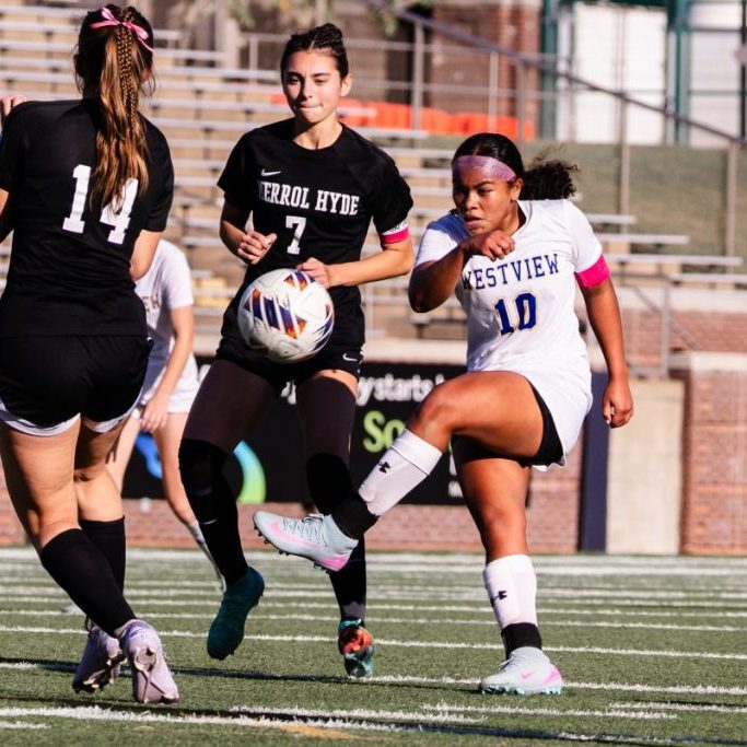 Westview's Ashlee Brent (10) scores two goals to lead the Lady Chargers to the Class A girls soccer state championship.